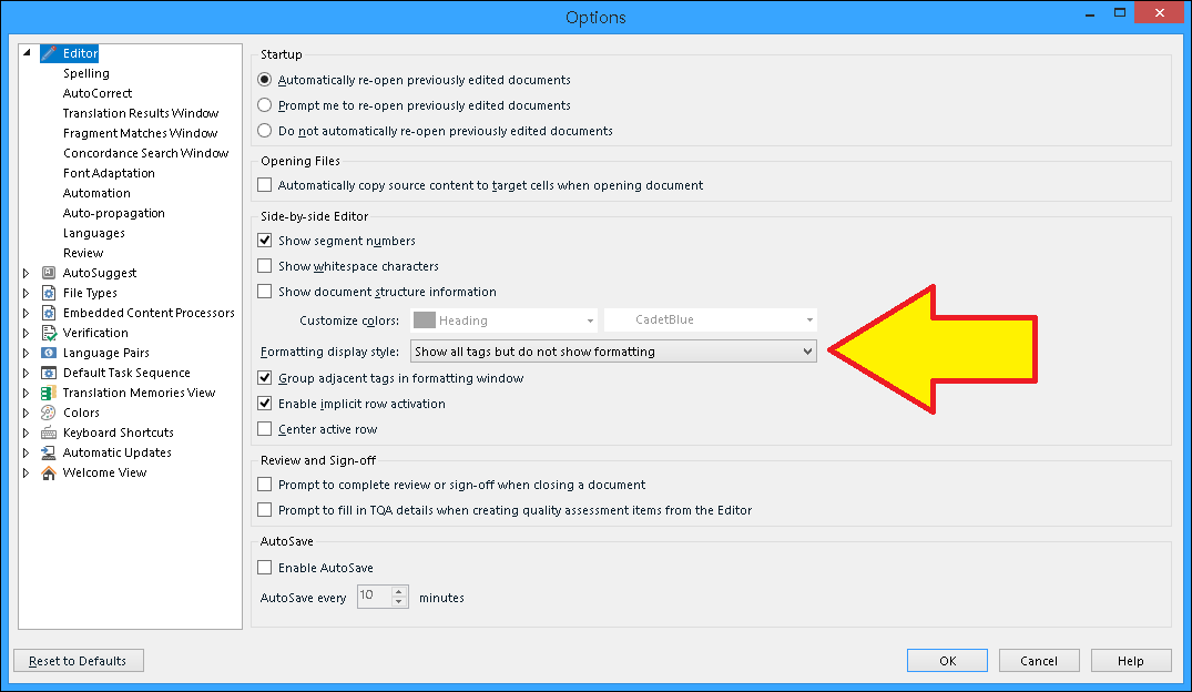 Trados Studio Options window with a red arrow pointing to 'Formatting display style' dropdown menu set to 'Show all tags but do not show formatting'.