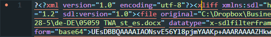 Screenshot of Trados Studio text editor showing an XLIFF file with a question mark at the beginning of the file, indicating a potential encoding issue.