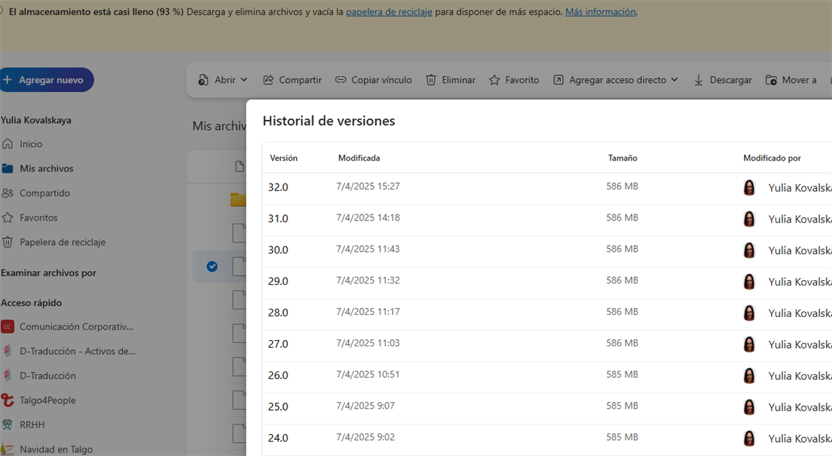 Screenshot of OneDrive storage almost full warning with a version history list showing multiple entries for a MultiTerm TDB, all modified by Yulia Kovalskaya with file sizes around 586 MB.