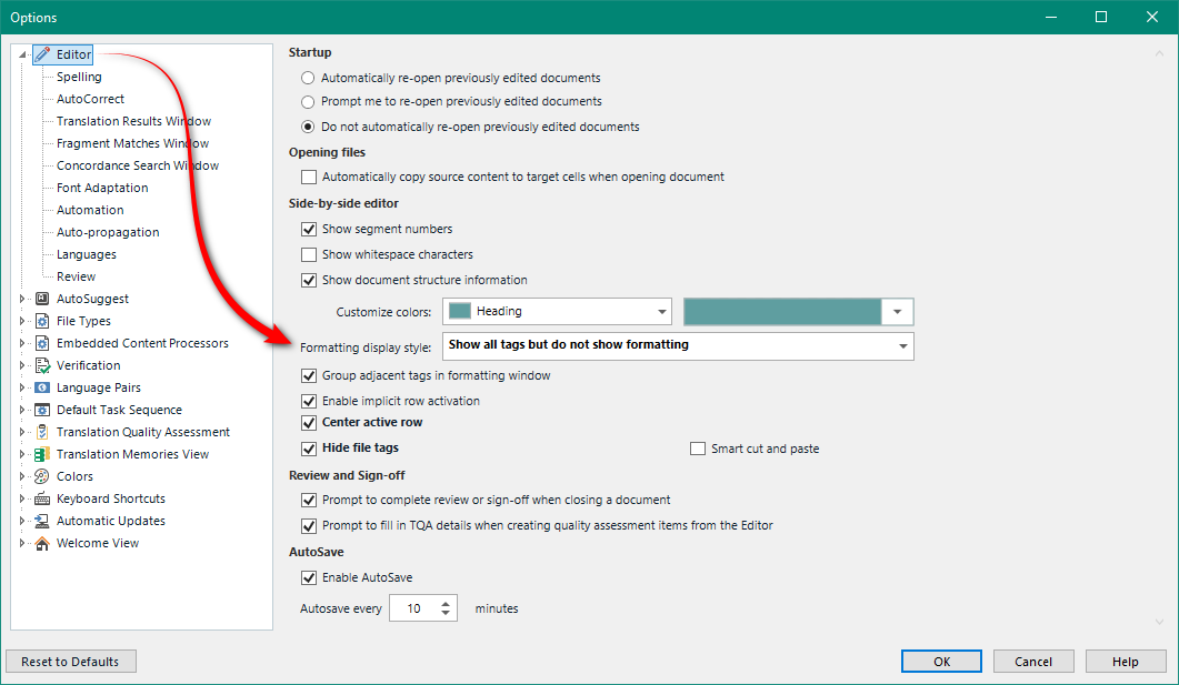 Trados Studio options window with Editor settings showing Startup options, Opening files preferences, and Formatting display style set to 'Show all tags but do not show formatting'.