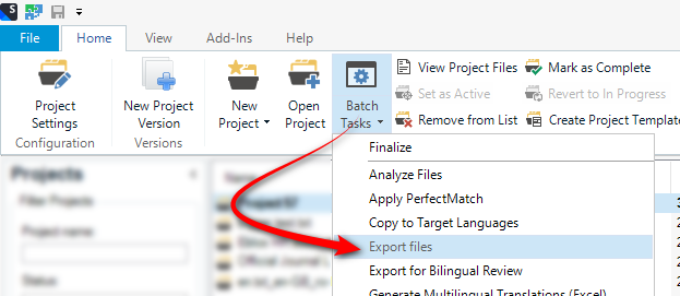 Trados Studio screenshot showing the 'Batch Tasks' dropdown menu with 'Export files' option highlighted by a red arrow.