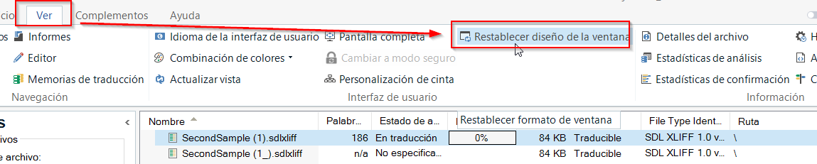 Trados Studio screenshot showing the 'View' tab with an option to 'Reset window layout' highlighted in red.