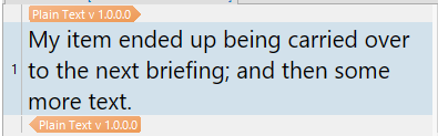 Screenshot showing a text segment labeled 'Plain Text v 1.0.0.0' with the content: 'My item ended up being carried over to the next briefing; and then some more text.'