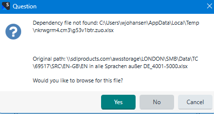 Trados Studio pop-up window titled 'Question' with a message about a missing dependency file and options to browse for the file with 'Yes', 'No', and 'Cancel' buttons.