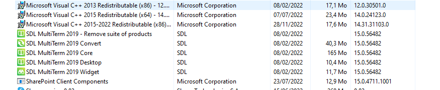 Control panel list of installed programs including various Microsoft Visual C++ Redistributables and SDL MultiTerm 2019 components, but missing Trados Studio 2022.