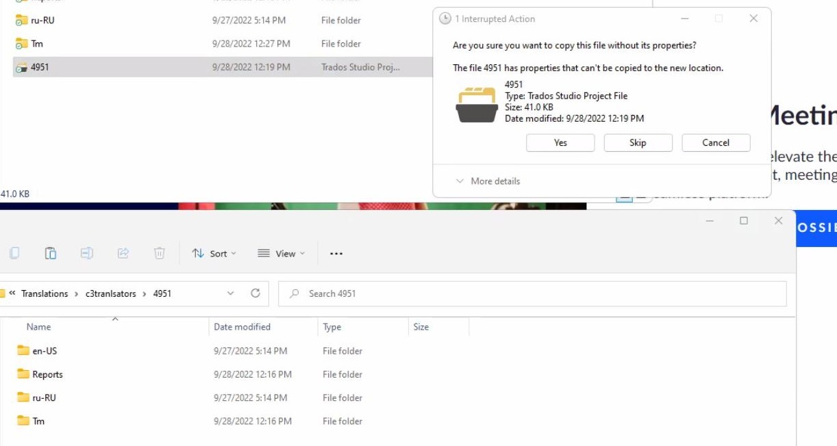 File explorer window showing Trados Studio project subfolders with a warning message about inability to copy the .sdlproj file.