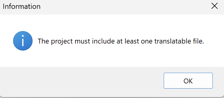 Trados Studio notification stating 'The project must include at least one translatable file.' with an OK button.