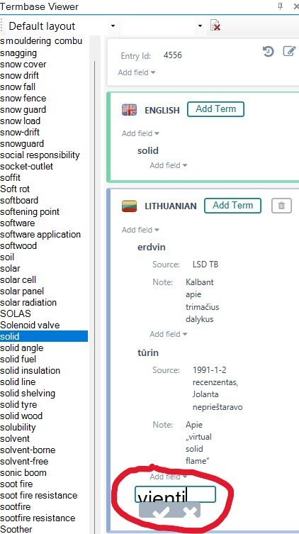 Termbase Viewer showing the term 'solid' in English and its Lithuanian translation with a red circle around the word 'vientil' in the Lithuanian section.