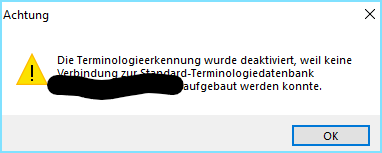 Warning message in Trados Studio stating 'The terminology recognition has been deactivated because a connection to the standard terminology database could not be established.' with an OK button.