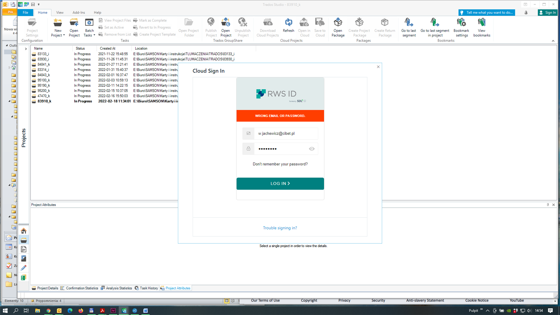 Trados Studio screenshot showing a Cloud Sign In error message stating 'WRONG EMAIL OR PASSWORD' for the email w.jachewicz@cibet.pl.