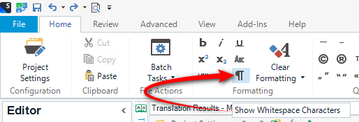 Trados Studio screenshot showing the Editor view with the 'Show Whitespace Characters' option highlighted in the Translation Results menu.