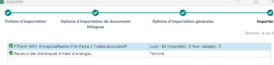 Trados Studio import summary showing 84 units read and 0 units imported with a green checkmark indicating completion.