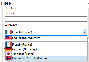 Trados Studio screenshot showing the 'Files' pane with a language selection dropdown menu open, displaying options including English (United States) and French (France).