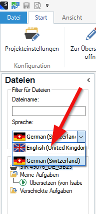 Trados Studio screenshot showing the file view with a red arrow pointing to the language drop-down menu, highlighting the German (Switzerland) option.