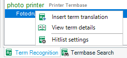 Right-click context menu on 'photo printer' term in Trados Studio with options to insert term translation, view term details, and hitlist settings.