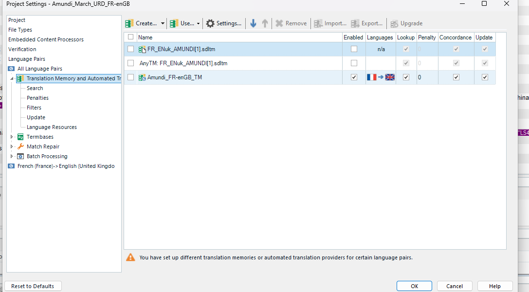 Trados Studio Project Settings window showing Translation Memory and Automated Translation settings with an error message at the bottom stating 'You have set up different translation memories or automated translation providers for certain language pairs.'