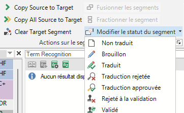 Screenshot of Trados Studio interface showing mixed languages in menus, with some options in French like 'Fusionner les segments' and others in English like 'Copy Source to Target'.