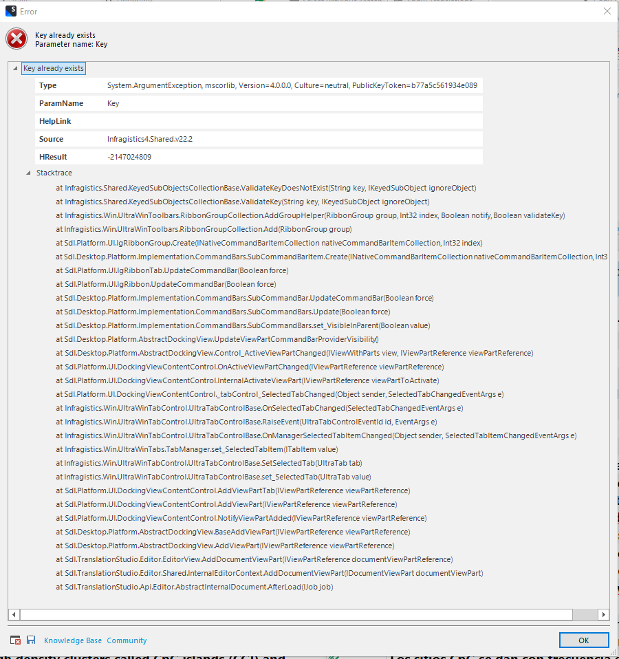 Error dialog in Trados Studio showing 'Key already exists' with details including Type, ParamName, HelpLink, Source, HResult, and a long stack trace. OK button is visible at the bottom.