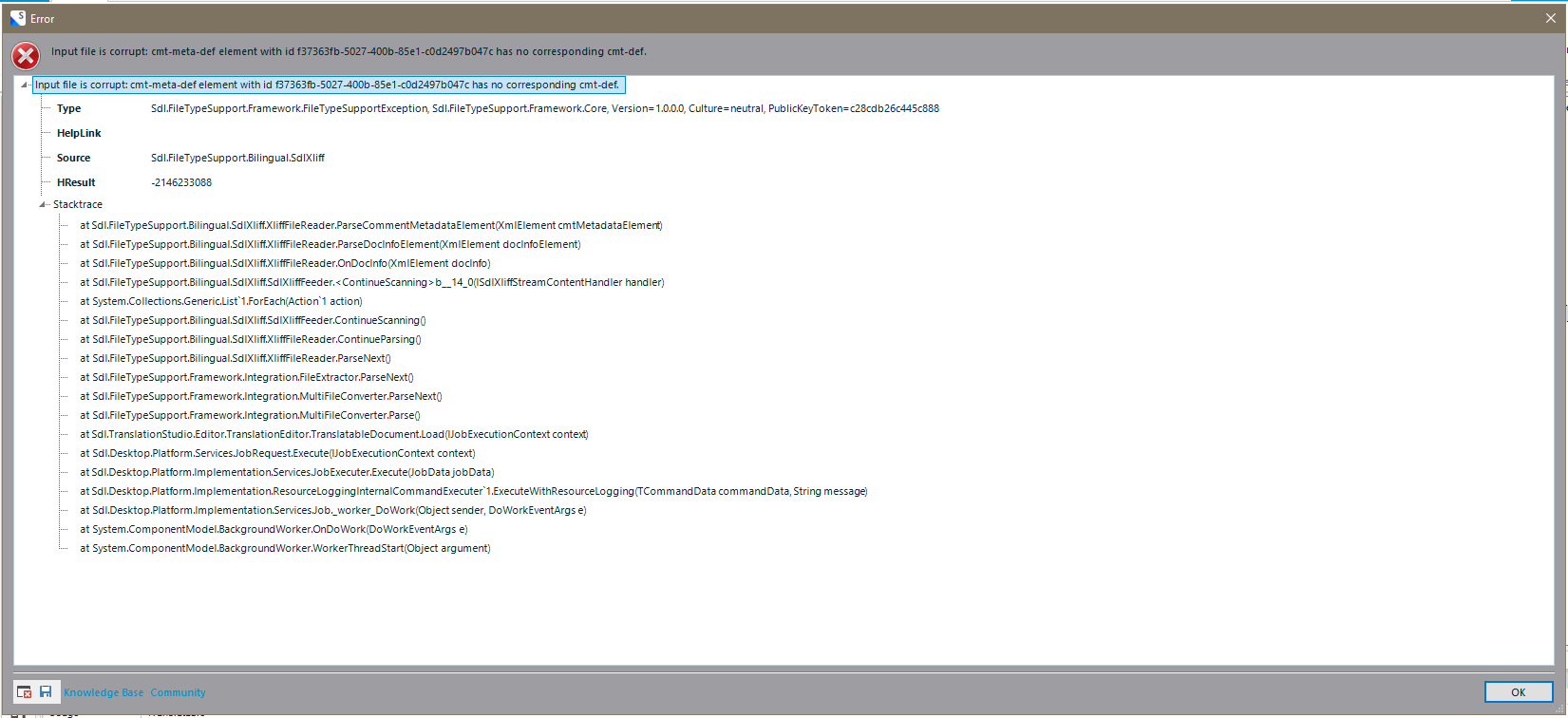 Detailed error dialog in Trados Studio showing 'Input file is corrupt: cmt-meta-def element with id xxxxxxxx-xxxx-xxxx-xxxx-xxxxxxxxxxxx has no corresponding cmt-def' and a stack trace.