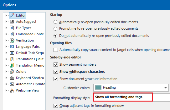 Trados Studio options window showing the Editor settings. The 'Show all formatting and tags' option is highlighted in red under the Formatting display style section.