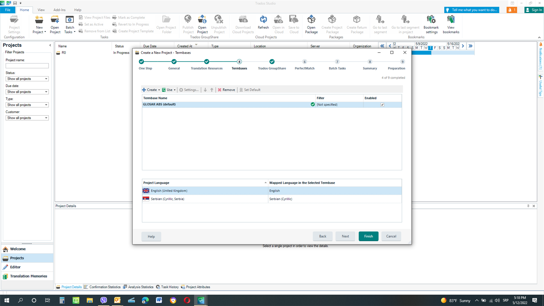 Trados Studio screenshot showing the Termbases tab with 'GLOSAR ABS (default)' termbase added, project languages set to English (United Kingdom) and Serbian (Cyrillic, Serbia).