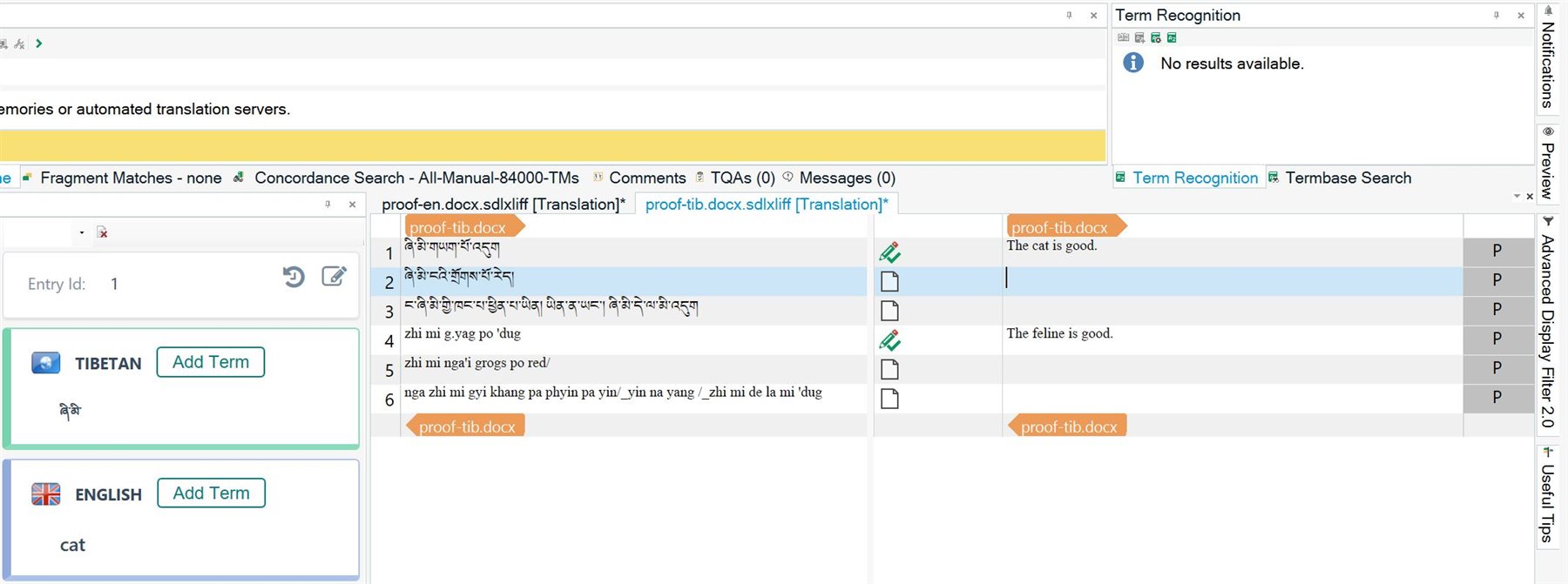 Screenshot of Trados Studio with a Tibetan to English termbase entry for 'cat' but no term recognition in the translation column.