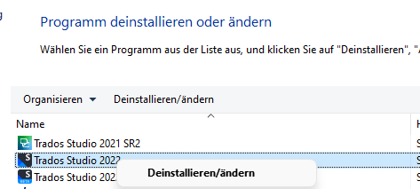 Screenshot of the 'Uninstall or Change a Program' window with 'Trados Studio 2022' selected and the 'UninstallChange' option highlighted.