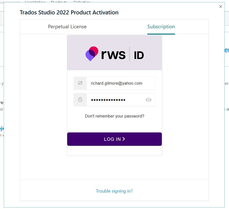 Trados Studio 2022 Product Activation window on the Subscription tab. It shows an RWS ID login form with email, password fields, and a 'Log In' button, along with a 'Trouble signing in?' link.