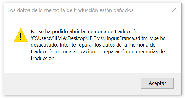 Error message in Trados Studio stating 'The translation memory data is damaged. The translation memory 'C:UsersSILVIADesktopLF TMsLinguaFranca.sdlmt' could not be opened and has been deactivated. Try repairing the translation memory data in a translation memory repair application.' with an accept button.