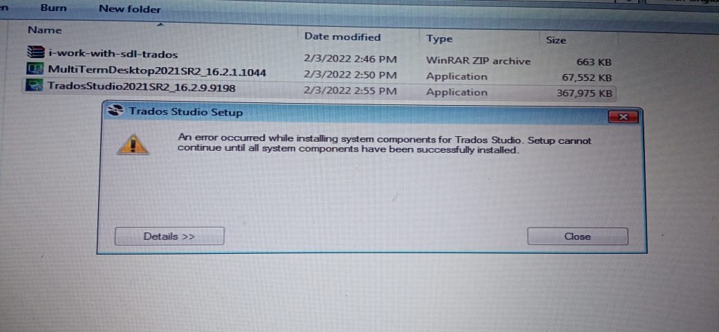 Screenshot of a computer folder with files related to Trados Studio installation and an error message pop-up saying 'An error occurred while installing system components for Trados Studio. Setup cannot continue until all system components have been successfully installed.'