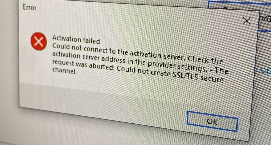 Error message in Trados Studio stating 'Activation failed. Could not connect to the activation server. Check the activation server address in the provider settings. - The request was aborted: Could not create SSLTLS secure channel.' with an OK button.