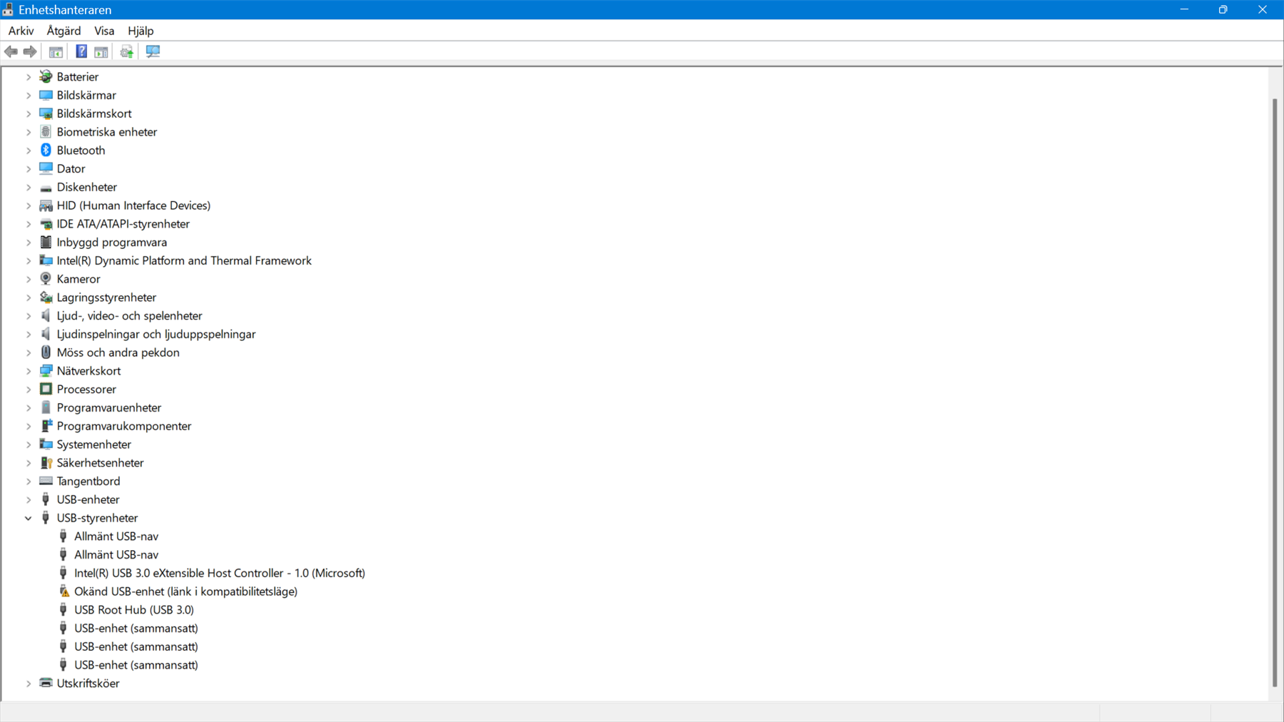 Device Manager window showing a list of hardware categories, including USB controllers with an unknown USB device highlighted.