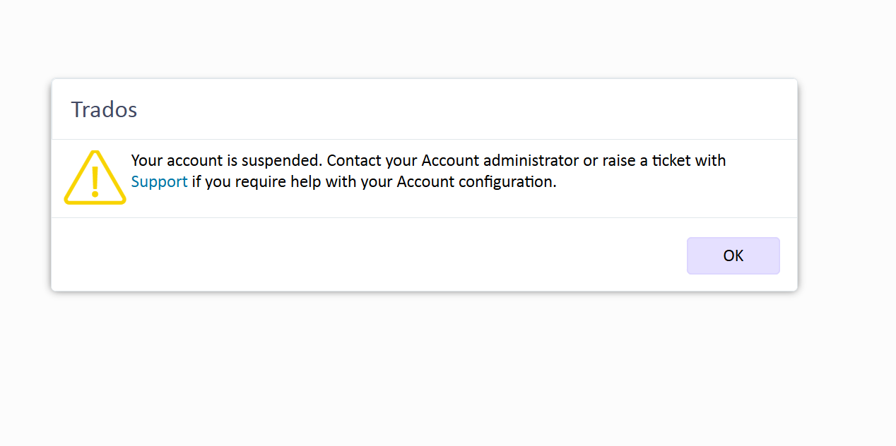 Trados warning message stating 'Your account is suspended. Contact your Account administrator or raise a ticket with Support if you require help with your Account configuration.' with an OK button.