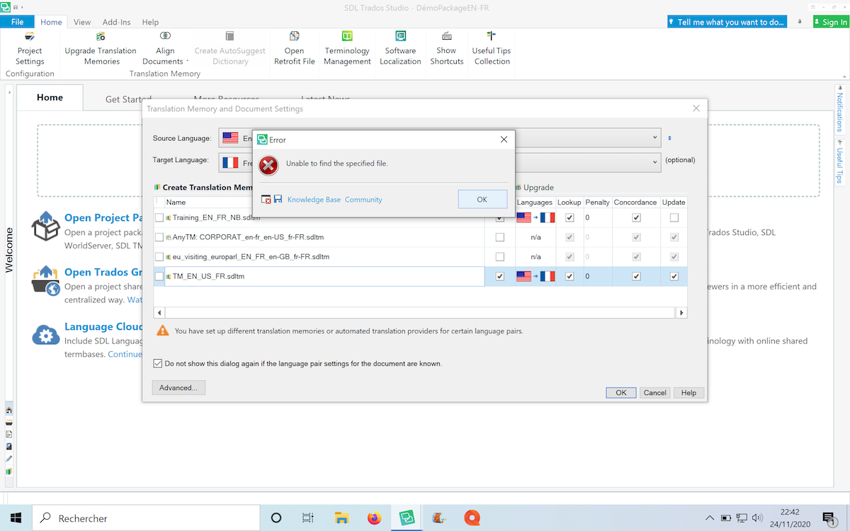SDL Trados Studio error message popup saying 'Unable to find the specified file.' with an orange triangle warning next to Translation Memory in the background.