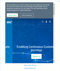 Screenshot of Trados Studio login dialog with a browser error displaying a blank page and a cookie consent banner overlay.