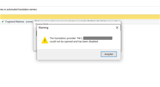Warning pop-up over SDL Trados Studio software with message: 'The translation provider TM name could not be opened and has been disabled.'