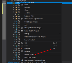 Right-click context menu in Trados Studio Solution Explorer showing options with a red arrow pointing to 'Unload Project'.