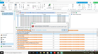 Trados Studio error message 'An error occurred whilst trying to determine file version' with a red exclamation mark icon, displayed over the Editor workspace with multiple segments of text.