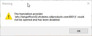 Warning dialog box in Trados Studio showing an error message that the translation provider 'ets:langoffices02.etsdemo.sdlproducts.com:8001' could not be opened and has been disabled.