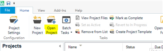 Trados Studio interface showing the Home tab with options for Project Settings Configuration, New Project, Open Project, and Batch Tasks. The Projects list is visible below.