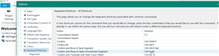Trados Studio keyboard shortcuts settings window showing 'confirm and move to the next unconfirmed segment' assigned to 'ctrl+enter'.