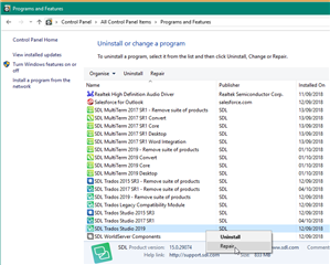 Windows Control Panel showing Programs and Features with a list of installed programs including SDL Trados Studio 2019.