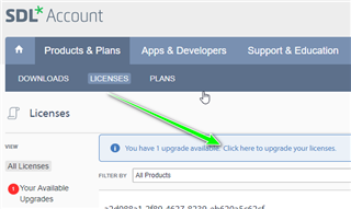 SDL Account webpage with a green arrow pointing to a notification that reads 'You have 1 upgrade available! Click here to upgrade your licenses.'