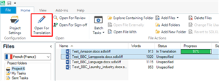Trados Studio interface showing the 'Open for Translation' icon highlighted in red within the Home tab. Below, the Files section lists three files with their names, type, status, and progress, with one file at 57% translation progress.