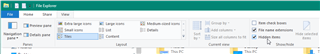 File Explorer window with View tab selected showing Options button and 'Show hidden files, folders, and drives' option checked.