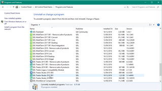 Control Panel window showing Programs and Features with a list of installed programs including SDL Trados Studio 2017 SR1 highlighted for repair.