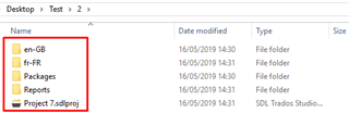File explorer window showing a Trados Studio project folder with subfolders for English (en-GB) and French (fr-FR), and a Project file highlighted.