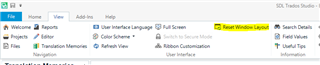 Trados Studio screenshot displaying the 'View' tab with an option 'Reset Window Layout' highlighted in yellow.