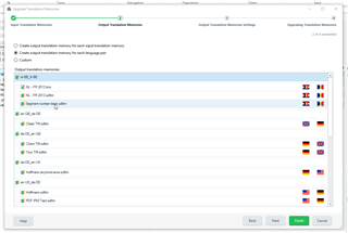 Trados Studio screenshot showing the Upgrade Translation Memories dialog with a list of translation memory files and warning icons indicating potential issues.