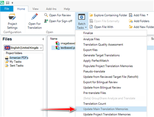 Trados Studio screenshot showing the 'Batch Processing' menu with an arrow pointing to 'Update Main Translation Memories' option.